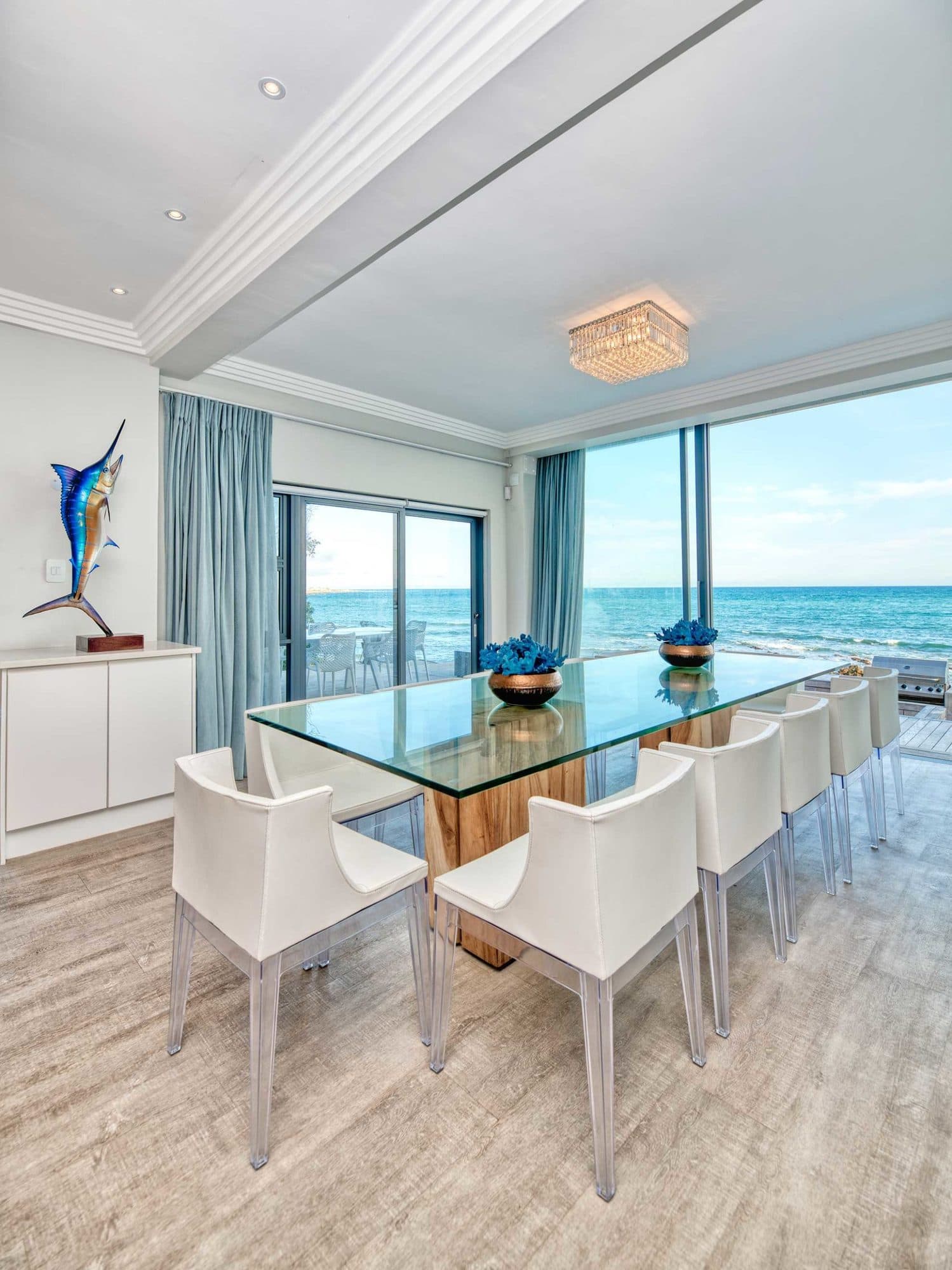The dining table and marlin sculpture at Marlin Manor